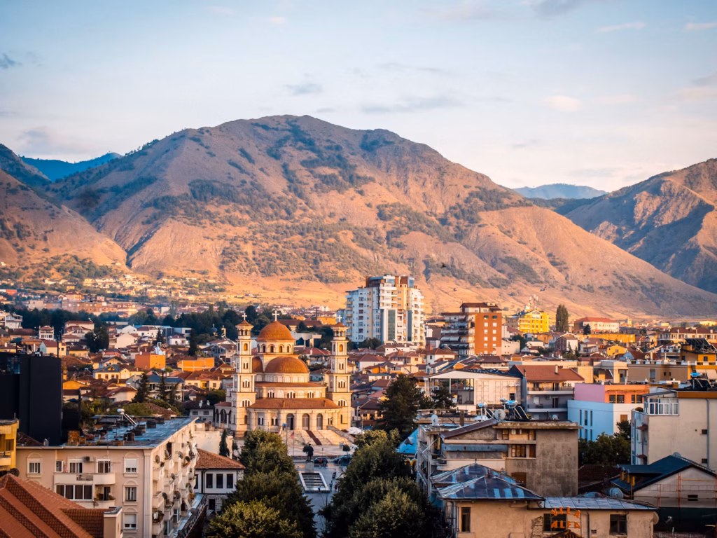 Albania Cityscape — underrated countries to visit Albania cityscape with mountains in the background — underrated countries to visit
