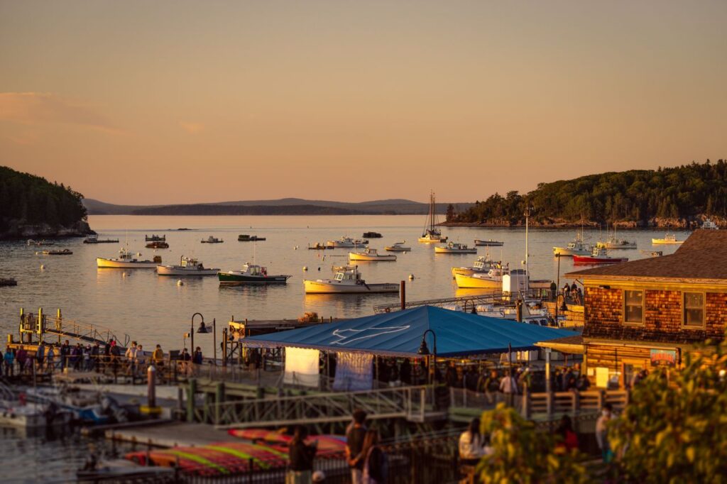Bar Harbor Sunset — charming small towns in the USA Sunset over Bar Harbor, Maine with boats in the harbor and a coastal view. — charming small towns in the USA