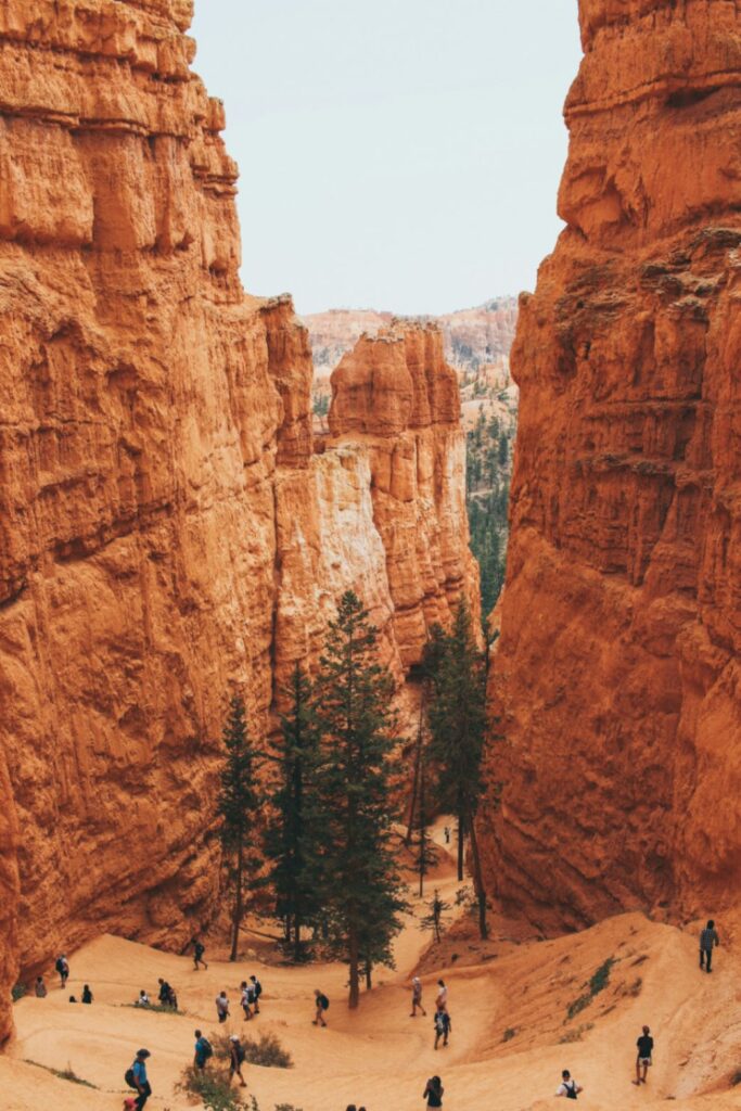 Bryce Canyon National Park — RV USA road trip routes Bryce Canyon National Park with towering orange rock formations and visitors exploring the trails. — RV USA road trip routes