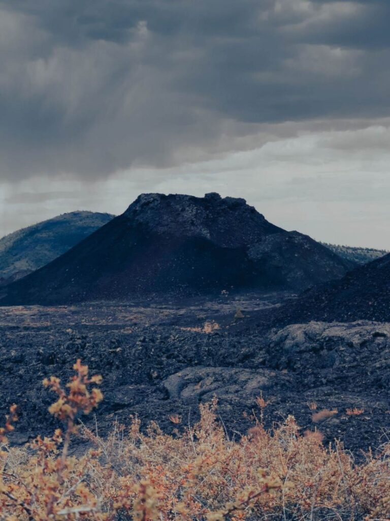 Craters of the Moon National Monument — secret places in the USA Craters of the Moon National Monument landscape with volcanic formations and dark skies. — secret places in the USA