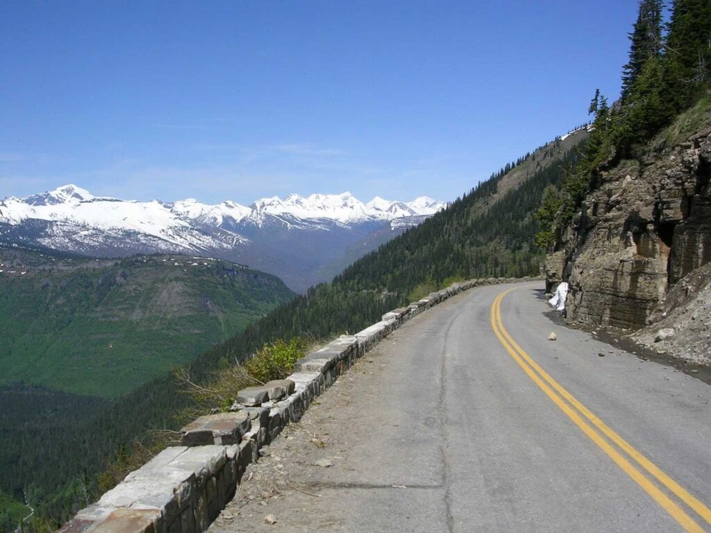 Going-to-the-Sun Road — USA Road Trips Going-to-the-Sun Road in Glacier National Park with snow-capped mountains — USA Road Trips