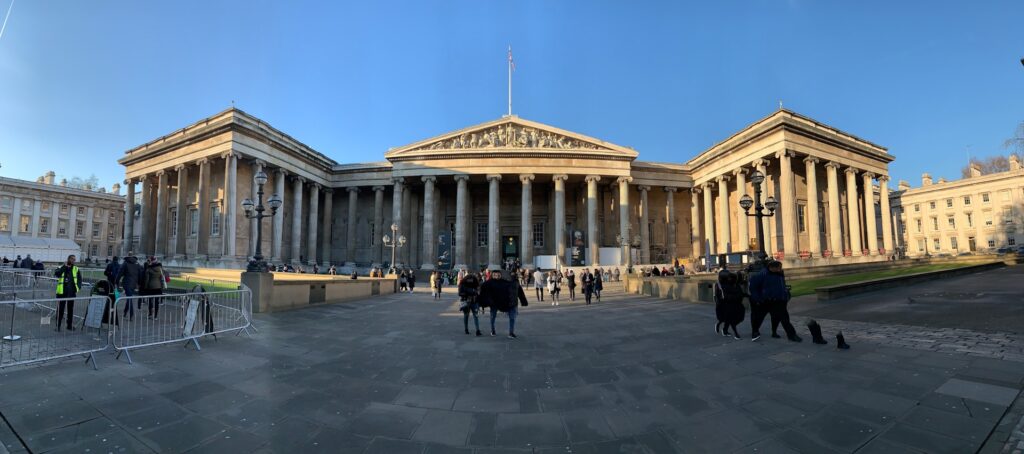 The British Museum — Famous London Landmarks Famous London Landmarks: The British Museum exterior with visitors.