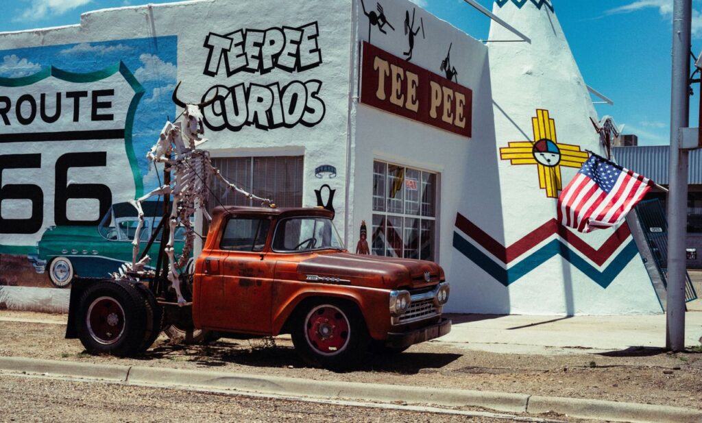 Historic Route 66 Attraction — RV USA road trip routes Historic Route 66 roadside attraction with a vintage truck and skeleton decoration. — RV USA road trip routes