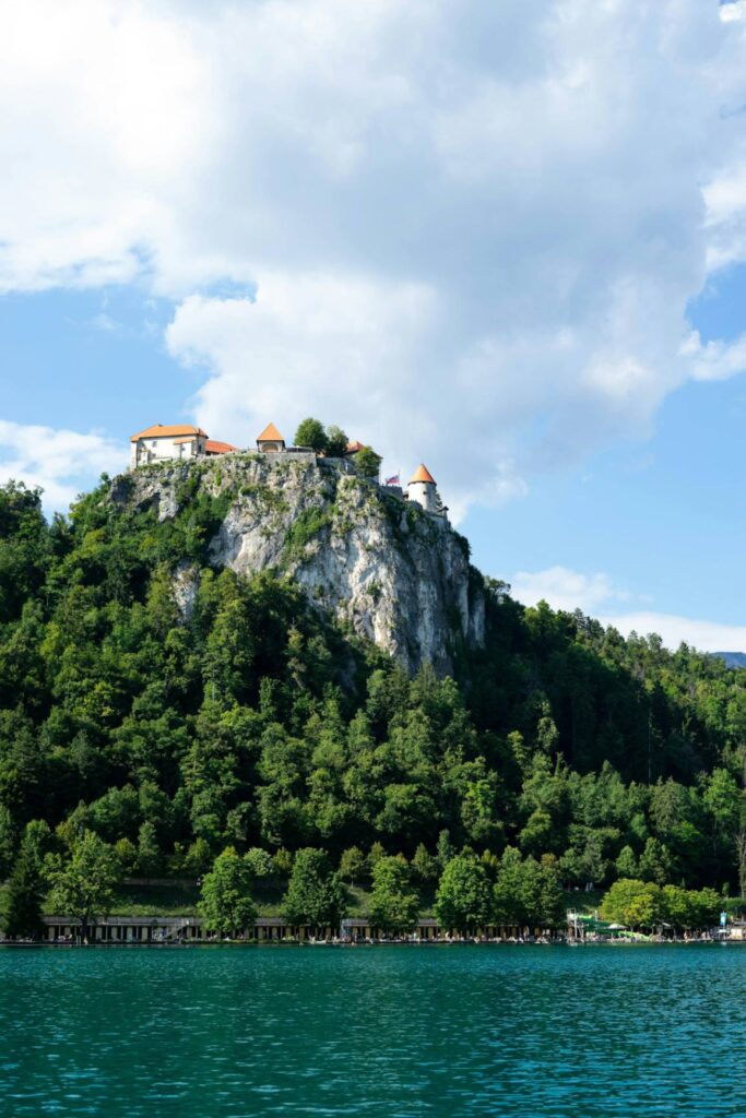 Bled Castle Overlooking Lake Bled — Europe travel destinations Bled Castle perched on a cliff above Lake Bled in Slovenia. — Europe travel destinations