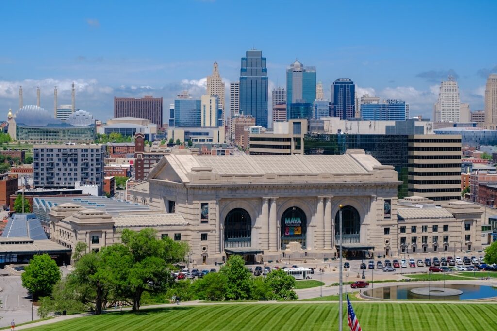 Kansas City Skyline — cheap places to travel in USA Kansas City skyline with Union Station in the foreground — cheap places to travel in USA