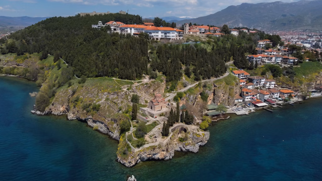 Lake Ohrid in North Macedonia — underrated countries to visit Aerial view of Lake Ohrid and the surrounding landscape in North Macedonia. — underrated countries to visit