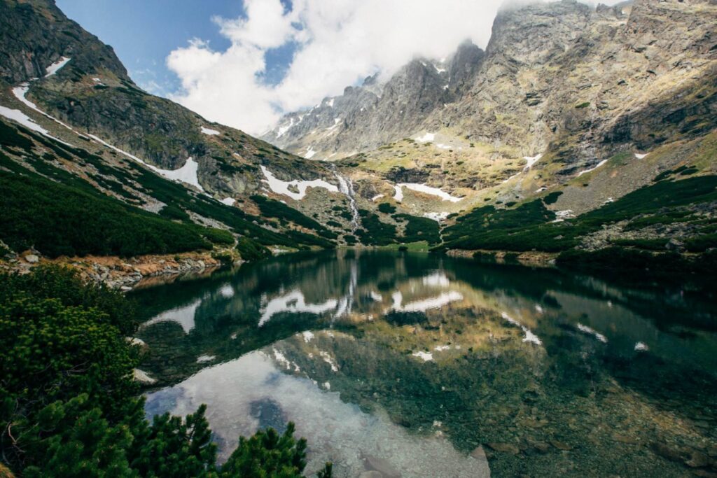 High Tatras: Slovakia’s Mountain Escape — places to visit in Slovakia High Tatras mountain scenery with a reflective alpine lake — places to visit in Slovakia