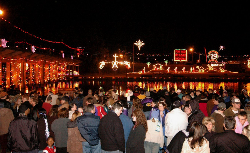 Natchitoches Christmas Celebration — Christmas towns in the USA Christmas towns in the USA with festive lights and crowds at night in Natchitoches, Louisiana.