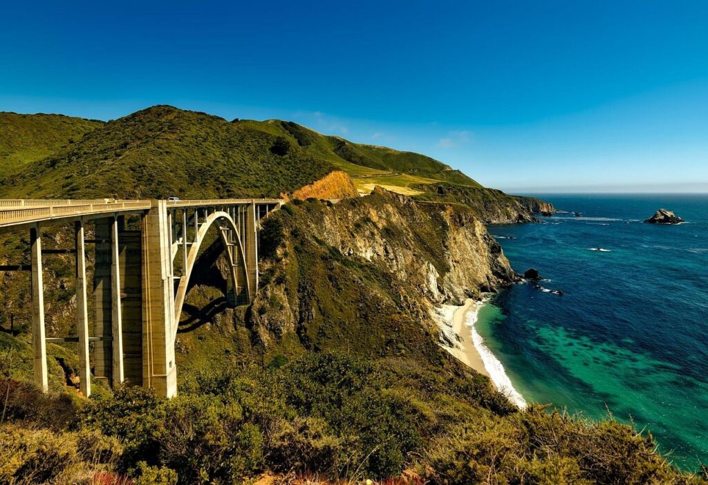 Pacific Coast Highway, California — Places to Visit in the Western USA Pacific Coast Highway, California, showcasing stunning coastal views and a bridge. — Places to Visit in the Western USA