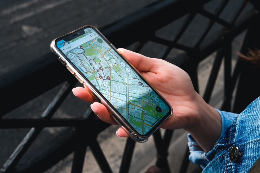 Solo Travel Safety Tips Map Smartphone displaying a detailed city map for solo travel safety tips navigation