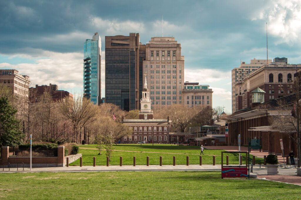 Philadelphia Skyline and Independence Hall — cheap places to travel in USA Philadelphia skyline with historic Independence Hall in view — cheap places to travel in USA
