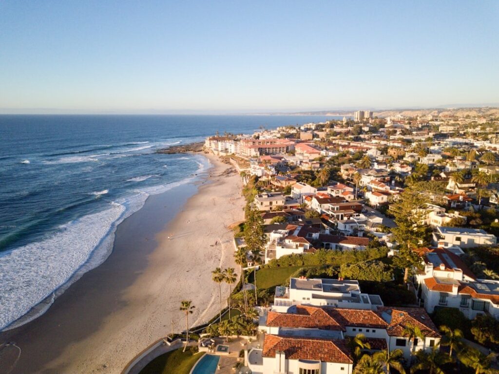 San Diego Coastline — Places to Visit in the Western USA Aerial view of San Diego coastline with beach and cityscape. — Places to Visit in the Western USA