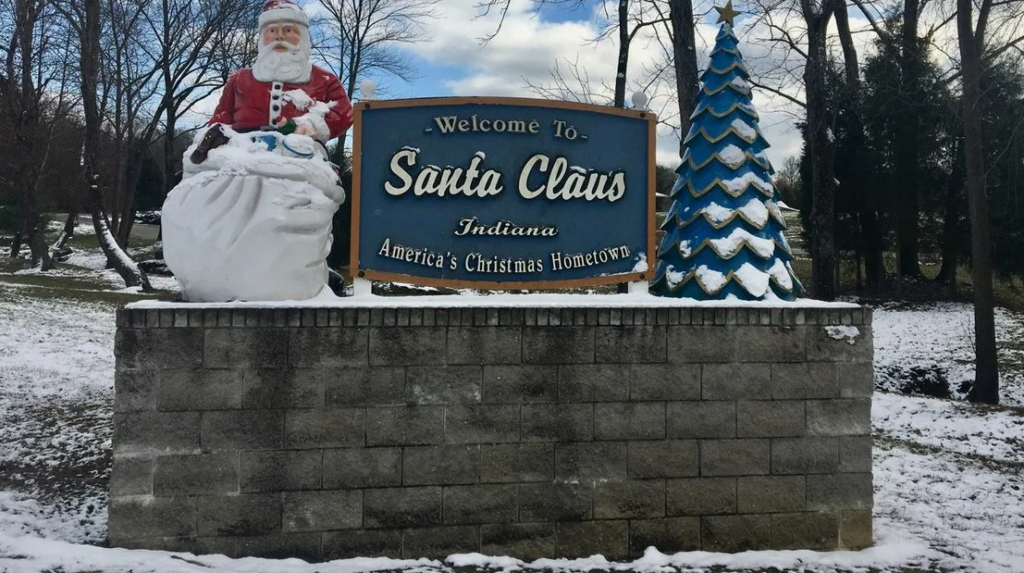 Santa Claus, Indiana Welcome Sign — Christmas towns in the USA Welcome sign for Santa Claus, Indiana, featuring Santa and a Christmas tree. — Christmas towns in the USA