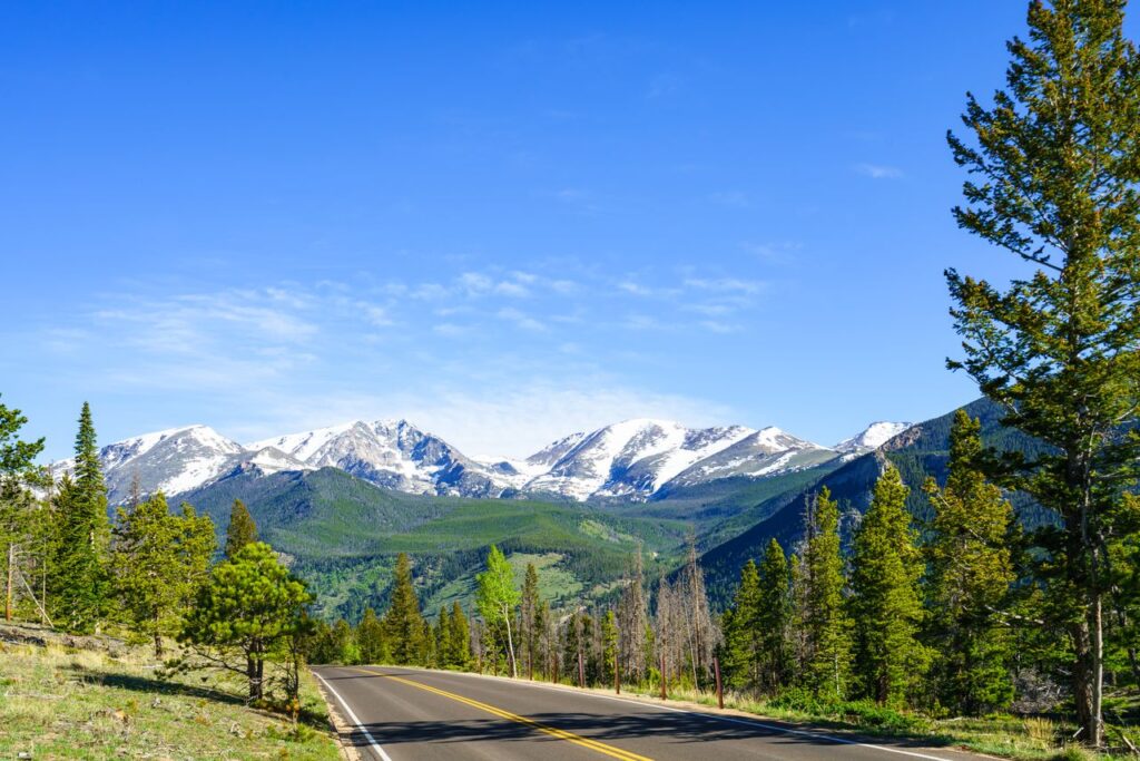 Scenic Drive to Rocky Mountain National Park — road trip USA ideas Scenic view of mountains along a road in Colorado. — road trip USA ideas
