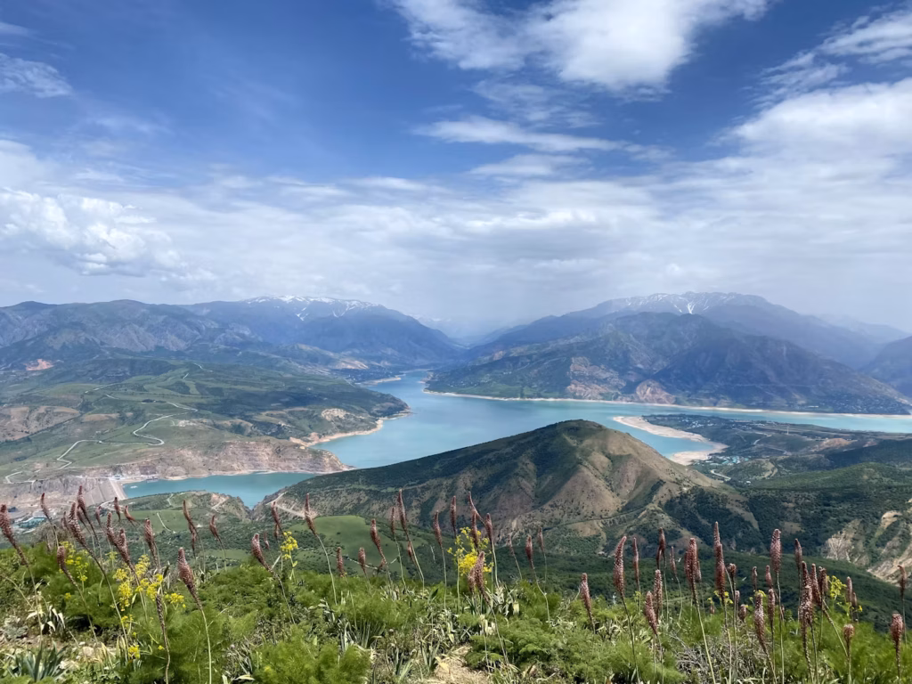 Uzbekistan's Scenic Beauty — underrated countries to visit Stunning landscape view of Uzbekistan's mountains and lakes — underrated countries to visit