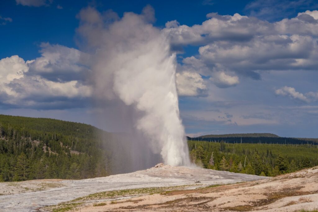 Yellowstone Geyser — RV USA road trip routes Geyser erupting in Yellowstone National Park — RV USA road trip routes