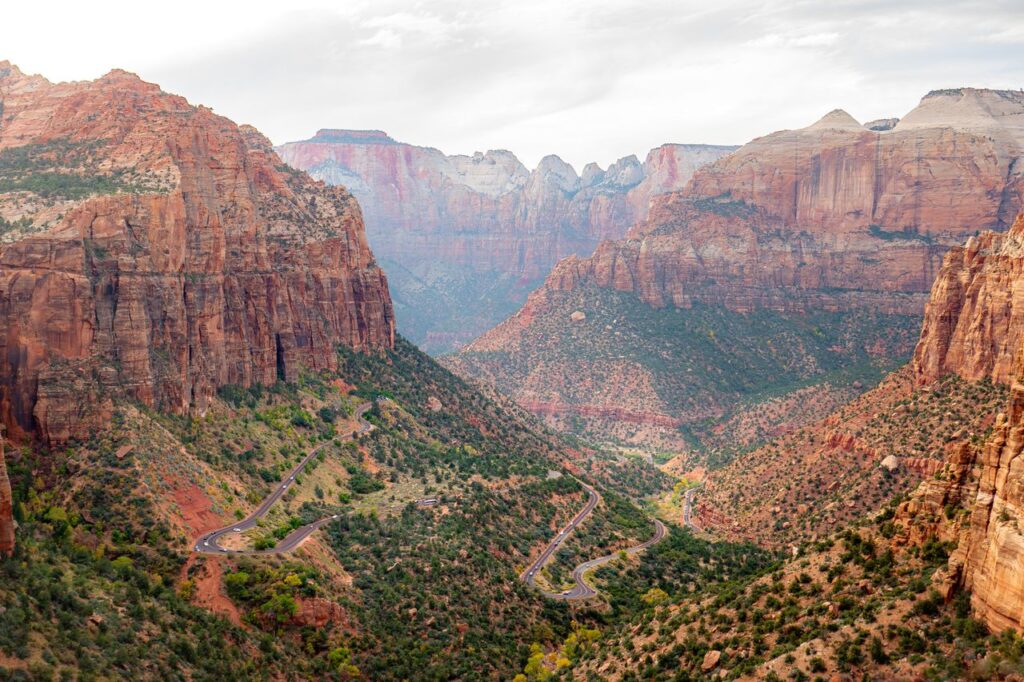 Zion National Park View — road trip USA ideas Stunning view of Zion National Park showcasing red rock formations and winding roads. — road trip USA ideas